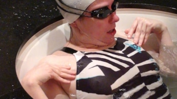 Wet bathtube sex in desginer swimsuit